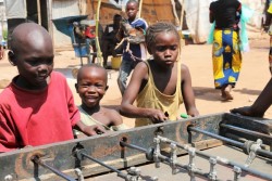 Bangui, Nov 13, 2015: Children play table football in Banguis airport Mpoko camp for internally displaced persons. During the summer of 2015 security had started to improve in town and the site was slowly getting ready to be shut down. A new outburst of violence in Sept and Oct led to new displacements.assistance to cash assistance. It is an empowering and dignified form of support to children and their families, with a positive effect on the local economy and with lower administrative costs.