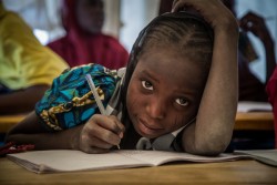 On 17 February, a girl looks up from writing during a class, in a temporary learning space in the Ngagam displacement camp in the Diffa region. In late February 2017, UNICEF Goodwill Ambassador Orlando Bloom travelled to Diffa, south-east Niger, to highlight the ongoing humanitarian crisis in West Africa’s Lake Chad Basin (Niger, Nigeria, Chad, Cameroon). Boko Haram violence has caused huge population displacements, leaving hundreds of thousands of children in a critical situation, out of education and at risk of malnutrition. Across the four countries, 2.3 million people are now displaced, making this one of the fastest growing displacement crises in Africa. The Diffa region currently hosts over 240,000 internally displaced people, refugees and returnees—including 160,000 children. UNICEF is providing safe environments for children in Niger and across the region to play, as well as helping them return to school, and training teachers to identify and support children traumatised by the increasing violence in the region. UNICEF is also providing lifesaving treatment for children suffering from severe malnutrition. “This visit has been extremely moving. Every single child I met is affected by this conflict and in desperate need of basic services such as clean water, psychological care and education to help them recover from the atrocities they have suffered and witnessed. They deserve a childhood,” said Bloom. UNICEF and its partners in Nigeria, Cameroon, Chad and Niger have increased the level of assistance to thousands of families in the region, with access to safe water, education, counselling and psychosocial support, as well as vaccines and treatment for malnutrition. However, a shortage of funding and difficult access due to insecurity have hindered the delivery of humanitarian assistance to thousands of children in need.