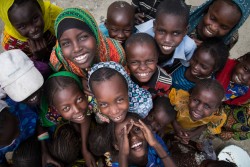 3 August 2016 - village of Tagal, Lake Chad region, Chad. Friends play together. A major humanitarian crisis is unfolding in Africa’s Lake Chad Basin, an area that comprises parts of Nigeria, Niger, Cameroon and Chad, where violence and destruction have caused huge population displacements, left hundreds of thousands of children trapped behind conflict lines and led to a dramatic increase in malnutrition.  Local communities are doing what they can to help those in need, offering shelter to many of the 2.6 million people forced to flee their homes – 1.4 million of them children – but they themselves rank among the world’s poorest and most vulnerable to poverty, conflict and climate change.  Almost 43,000 are displaced in Chad.