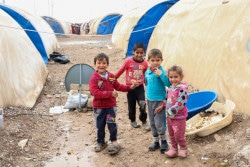 Children in Hamam al-Alil camp remain displaced from their homes.  UNICEF is providing winterization assistance, including warm clothes, boots and scarves for children in addition to regular education, child protection and WASH activities.