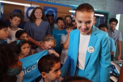 UNICEF supporter Millie Bobby Brown on the set of a video produced for World Children's Day 2018 on 24 August 2018 in New York City in the United States of America. Actor Millie Bobby Brown has teamed up with UNICEF Goodwill Ambassadors Orlando Bloom, Liam Neeson and Lilly Singh; singer-songwriter Dua Lipa and performance artists the Blue Man Group, in a new video released by UNICEF ahead of World Children’s Day, celebrated on 20 November 2018.   The short video shows the 14 year-old star – who has symbolically changed her name to Millie Bobby ‘Blue’ to mark the occasion – overseeing a global ‘go blue’ operation. Alongside her team of young helpers, Millie calls on fellow UNICEF Goodwill Ambassadors and supporters to join her in going blue – by wearing or displaying the colour blue – in support of children’s rights. As the story unfolds, viewers see the stars responding to Millie’s call while going about their daily lives. Liam Neeson bakes blue cupcakes while reenacting a famous scene from his cult-hit Taken, Dua is in studio re-recording the lyrics of her global hit Be The One from red to blue, Orlando is on a film set working under his new name – Orlando ‘Bluem’ – and Lilly is at home making ‘blunicorn’ smoothies.  UNICEF’s annual World Children’s Day is commemorated each year on 20 November and marks the anniversary of the adoption of the Convention on the Rights of the Child. The global day raises awareness and vital funds for the millions of children who are unschooled, unprotected and uprooted. This year, UNICEF is inviting the public to go online and sign its global petition asking for leaders to commit to fulfilling the rights of every child now and for future generations, and to Go Blue for every child by doing or wearing something blue on 20 November.