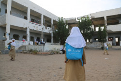 Children walk in the courtyard of the Al-Fawz School which was damaged in fighting in Almansouriyah, Hodeidah, western Yemen, Wednesday 15 March 2017. As of March 2017, children in Yemen are living on the brink of famine and widespread malnutrition has drastically increased their risk of disease. More than half of Yemen’s medical facilities are no longer functional and the health system is on the verge of collapse. Families’ coping mechanisms in Yemen are being stretched to their limit as the war enters its third year risking a total collapse in resilience. The poorest country in the Middle East is facing an economic, social and humanitarian crisis as never before. Around one in three children (2.2 million individuals) under the age of five in Yemen are malnourished, of whom 1.7 million are suffering from moderate acute malnutrition and 462,000 are suffering from severe acute malnutrition (SAM). A child suffering from SAM is around ten times more at risk of death than a healthy child if not treated in time. UNICEF is scaling up its humanitarian response, including supporting the treatment of 323,000 children against severe acute malnutrition and providing basic healthcare services to one million children and over half a million pregnant and breastfeeding mothers.