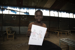 Falluoch Jeremia, 11, is holding a drawing of his parents whom he hasn’t seen for two years. Last time they saw each other was when bullets were flying in Malakal. They got separated and haven’t seen each other since. Caseworker Simon Char has just taken the boy’s information and asked questions about his family. The information will go into the national database together with a picture of Falluoch and hopefully the parents are still alive and found. UNICEF and partners have reunified close to 6000 children since the conflict broke out in 2013. Still, over 12,000 children are waiting for family tracing and reunification.