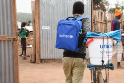 A child leaving the release site with his reintegration package, after being formally released from the armed group using them. The package includes clothes, shoes, soap, hygiene and water supplies. The release marks the formal separation from the armed group the child has been used by, and the beginning of a three-year-long reintegration programme, including psychosocial support, education and health services. 119 children were released from armed groups in Yambio 12 February 2019. The last year over 1,000 children in South Sudan have been released from armed forces and armed groups, making the total number released since the conflict started surpassing 3,000. EMBARGOED until 00:01 GMT on 12 February 2019