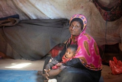 25-year-old Uhood lives in an internally displaced people’s camp (IDP) in Lahj governorate, southern Yemen. She has fled her home in Taiz three years ago due to the intensive fighting. Uhood is a mother of two children, 3-year-old and four-month-old girls. Currently, her husband works as a carrier; helping others carry their goods. Uhood said, “He manages to get money sometimes and sometimes come back home empty handed.” As a result, Uhood and her family eat less quality and quantity of food. During her last delivery, November 2018, Uhood delivered her baby in a private hospital from 3 pm until 3 pm the next day. (normal delivery) “Because my body was weak, it took me a full day to deliver my baby as I was very week and could not push her.” She said that her husband had to sell his motorbike, so he can buy the hospital’s fees, 35,000 YR (around 70 $). Her husband used to transport people on it to earn a living. Uhood and her family are still living in the IDP camp in very poor conditions. Their main meal is bread with tea. Previously, they used to have yogurt and vegetables as well but they cannot afford it anymore. Besides her two daughters, Uhood once had another daughter who died last year when she was one year old. She died of acute watery diarrhea.