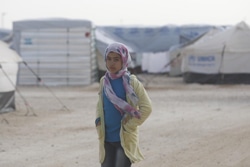 ザータリ難民キャンプに身を寄せるシリア難民の女の子。